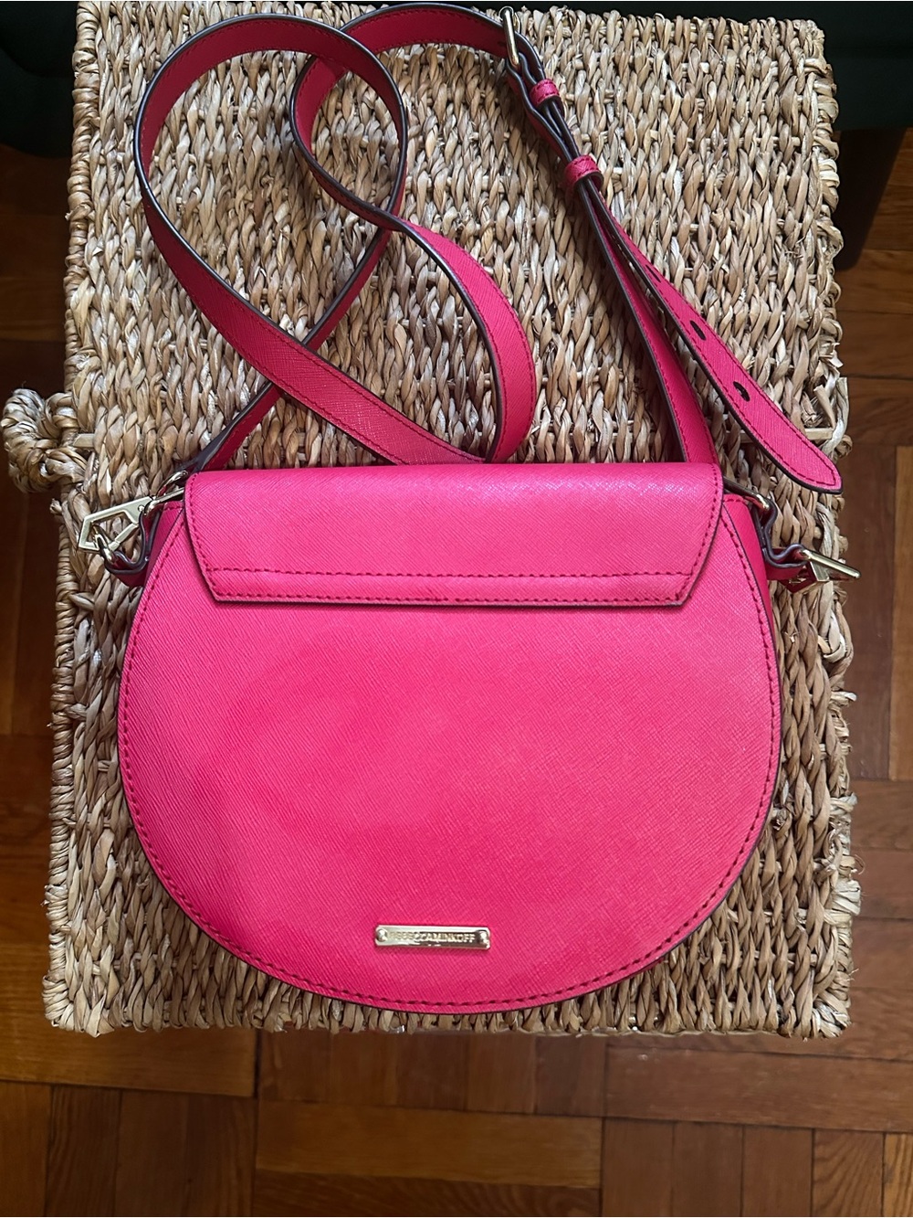 Rebecca Minkoff Astor Perforated Saddle Bag in the vibrant "Berry" (fuchsia pink